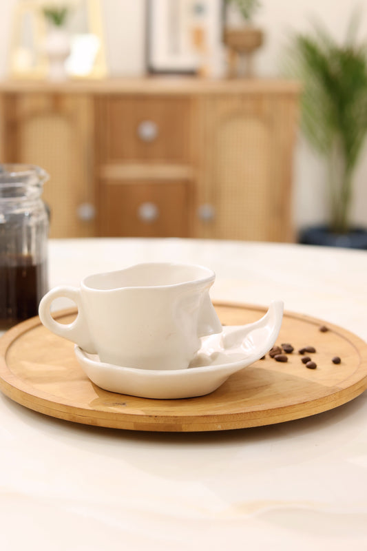 Abstract Face Cup and Saucer- White
