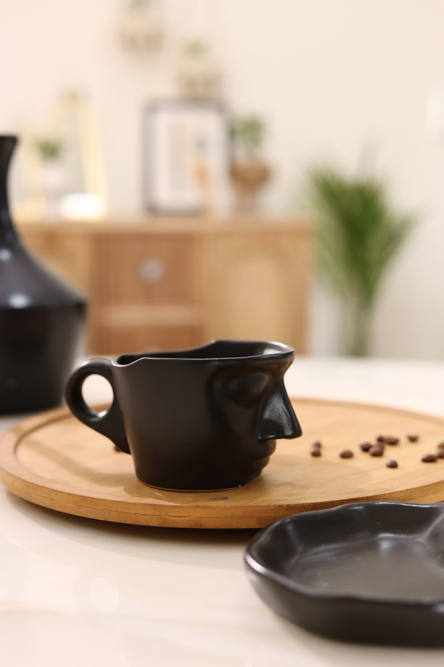 Abstract Face Cup and Saucer- Black
